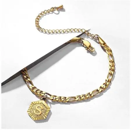 Get your beautiful initial carved into one of our 24K Gold Anklets!

DOES N
