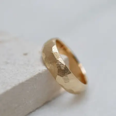 Something a little more rugged...a custom faceted band for a wonderful groom.

Handcra