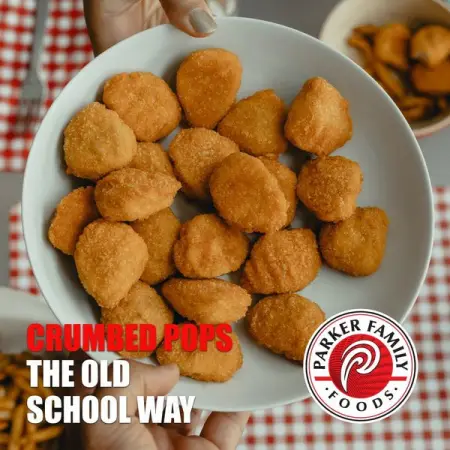Snatching Parker Family Foods golden crispy Crumbed Pops straight from the