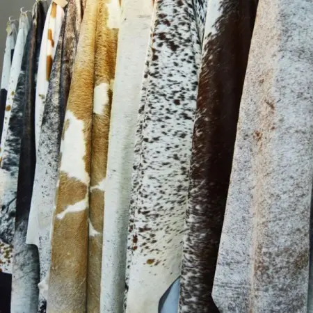 We are suppliers of genuine leather furniture and handbags,game and nguni ski