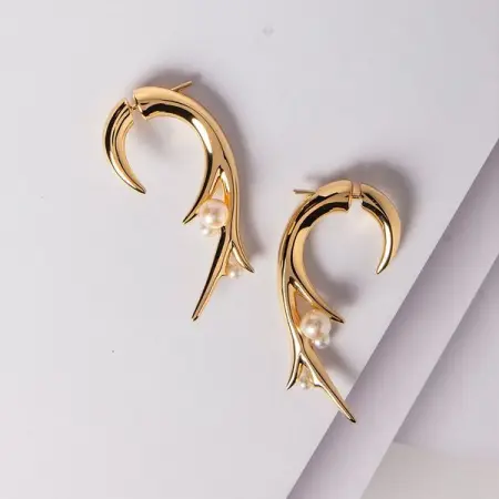 SHAUNLEANE.COM
Hooked Pearl Earrings
Shop Now
 