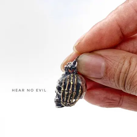 
Hear No Evil necklace.
Sterling silver with brass, comes with 60cm sterling silver chain w