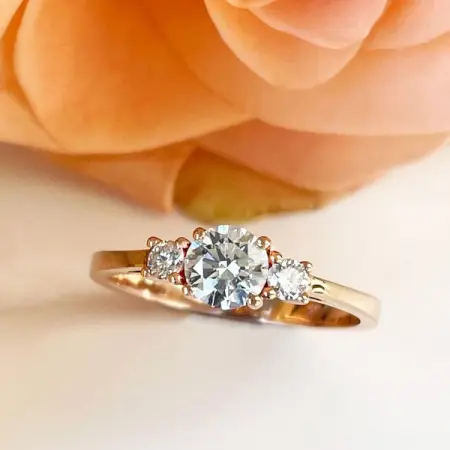 This trilogy engagement ring is ultra-feminine and truly romantic. Classic, timeless an