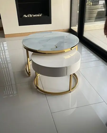 Gold frame nested coffee table with a high gloss wood and white glass available for purc