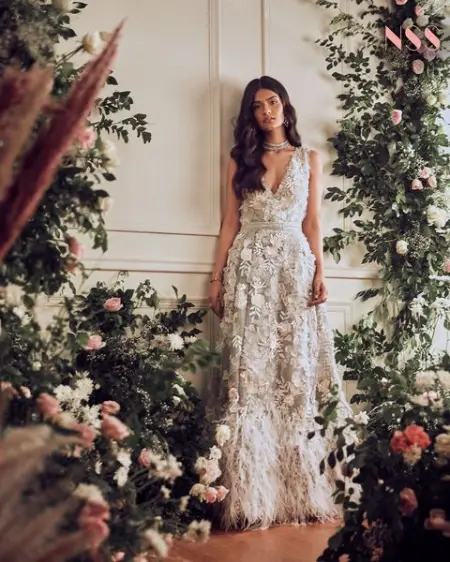 Amidst a meadow, lush and evergreen landscape of nature, presenting Camellia by Pallavi M