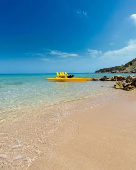The sandy beach of Porto Zante both a perfect spot for relaxation and starting point for