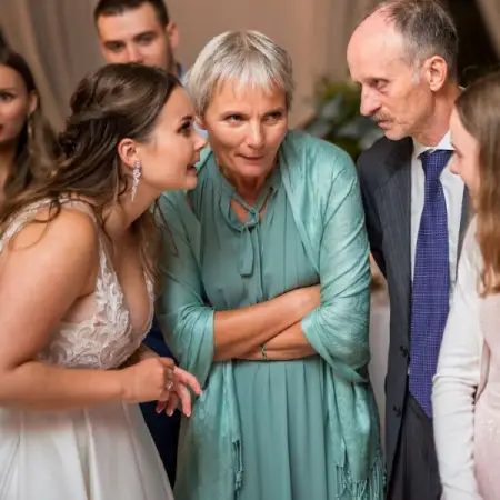 For being a janitor, this brides parents lowered the grooms father when he came to the w