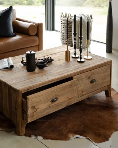 Made from reclaimed pine with a rustic finish and featuring four spacious drawers wit