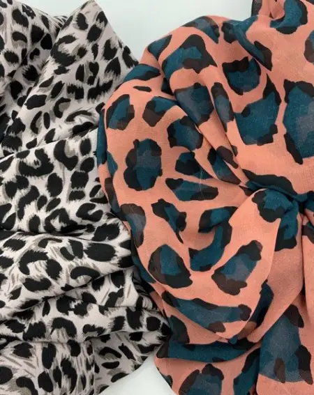 Vienna and Sheridan side by side. Two of our wild children scrunchies ready for