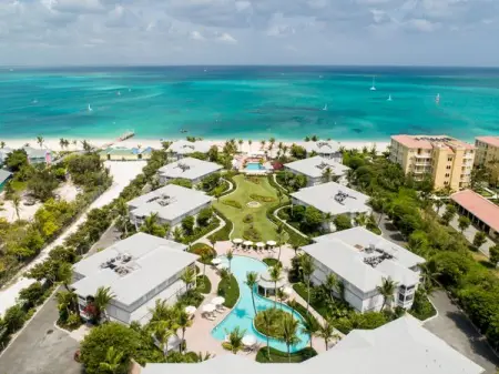 Unwind at our beachfront resort, with warm turquoise water, cool breezes and stunni