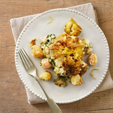 Norwegian salmon baked together with a base of spinach and leek and topped w