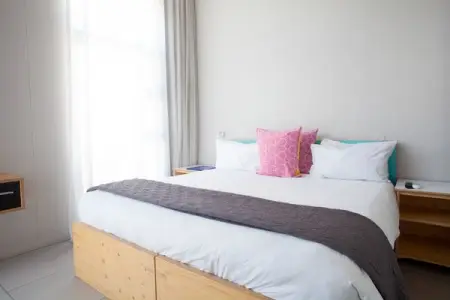 Its time to book that trip.  Our 3-Bed Studio Room is decked out with floor to ceiling w
