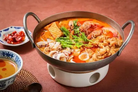 If you simmer the ground shrimp and peanut sauce with a large bone broth and other spices, y