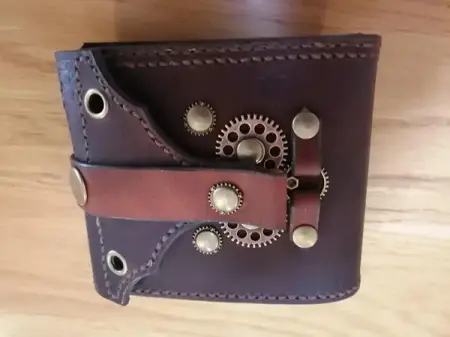 Custom leather projects made-to-order. Steampunk wallets, DnD screens, beje