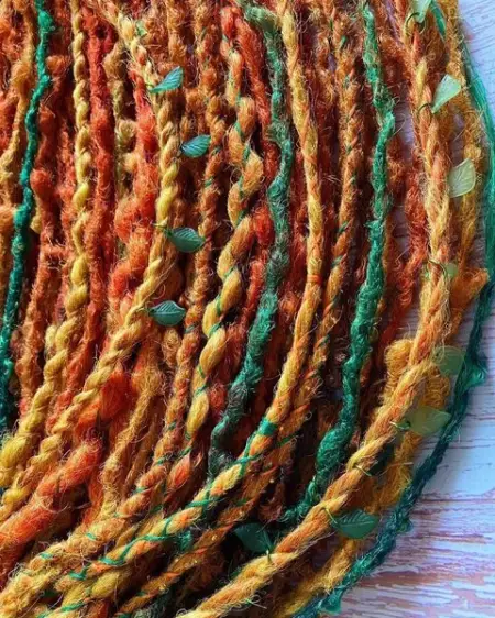 If you already decorate sets of dreadlocks and braids, why stop only at classic beads a