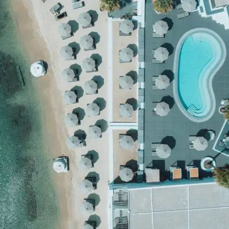 This white-on-white gem of 5 luxury at Ornos beach, Mykonos, has so many facets Specta