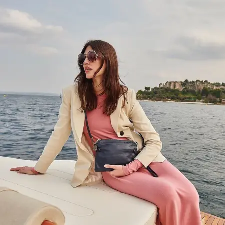 The VENETIAN Passport travel clutch with its zippered compartments and pockets i