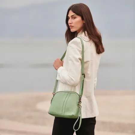 Our rounded edged BELLAGIO crossbody is a must in the collection of eve