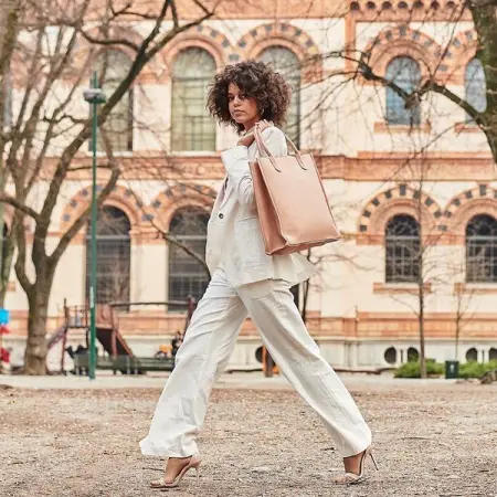 The TEODORA TOTE is marked by beautifully clean lines, structured handles an