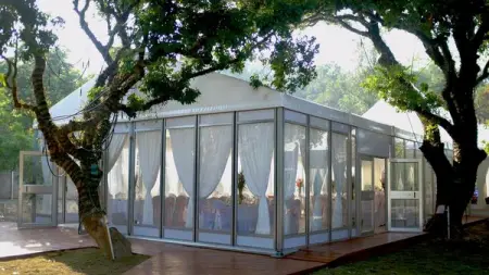 Mobile party tent with glass wall and full accessories such as tables, chairs, linings an