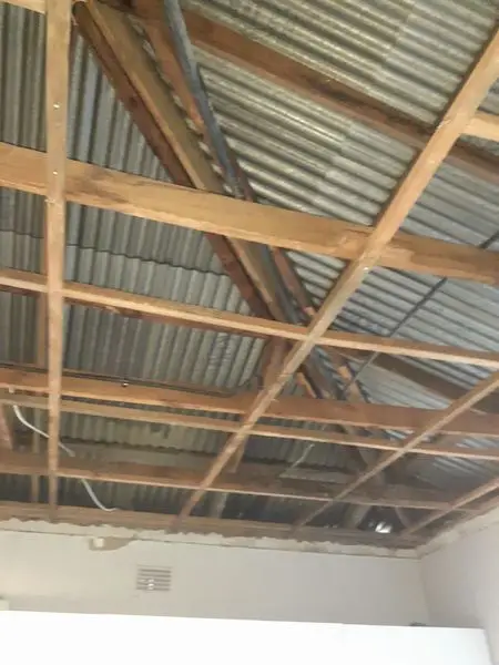 Rebuilding the framework of a collapsed ceiling.

Phone us - 011-462-0209
Branch